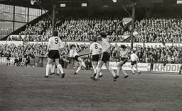 Don Givens smacks the ball over