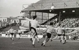 Gordon Hindson heads the ball across goal