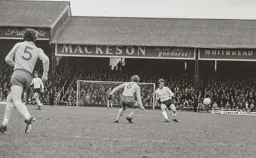 John Moore lays the ball off