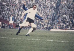 Mike Keen plays a ball out to the wing