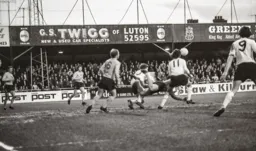 The Hull keeper commits as Peter Anderson (11) challenges in a fraught game