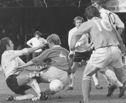 Mike Keen in a midfield battle