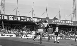 Peter Anderson heads over the bar