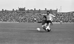 John Aston gets in a cross