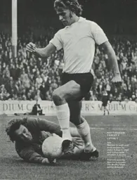 Viv Busby is stopped by the Forest goalkeeper