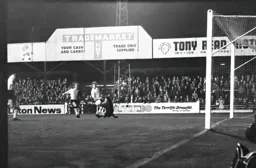 The Birmingham keeper turns Viv Busby’s shot round the post