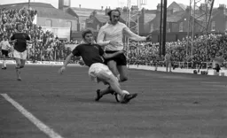 Rodney Fern is well tackled