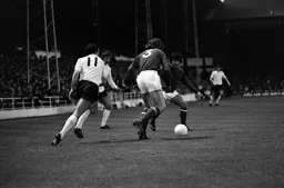 QPR defenders clear the danger