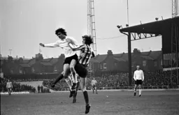 Jim Ryan climbs above defender