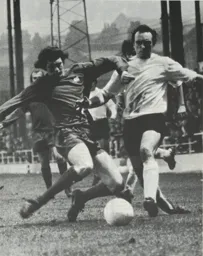 John Aston battles through