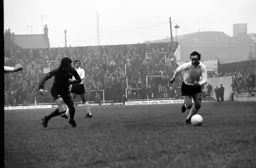 John Aston speeds down the wing