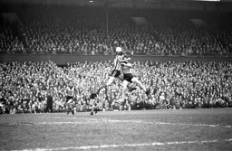 Barry Butlin wins this aerial duel