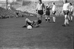 Barry Butlin holds his sore shin