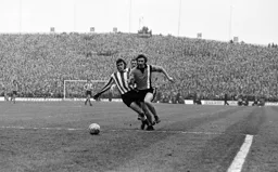 Derek Hales races into the box