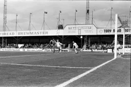 Barry Butlin heads for goal