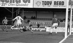 Peter Anderson goes close with a diving header