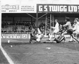 The ball goes narrowly wide despite the Town's best efforts