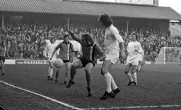 Rodney Fern attempts to control the ball