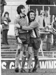 Barry Butlin receives the congratulations of Jimmy Husband