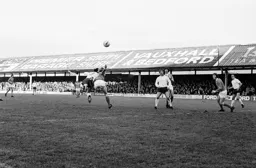 Jimmy Husband watches Barry Butlin head for goal
