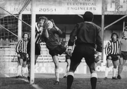 Notts keeper Eric McManus saves a Butlin effort