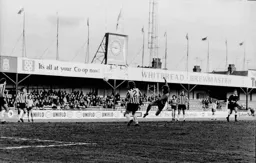 Alan West tries a volley