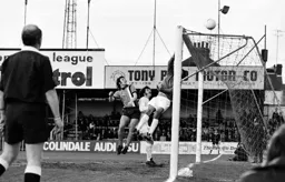 The keeper foils Jimmy Husband