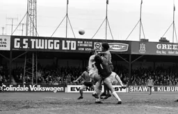 Barry Butlin gets his head to the ball