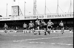Dave Watson clears from Jimmy Husband