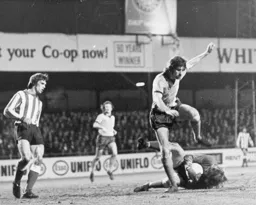 Barry Butlin hurdles the Sunderland goalkeeper