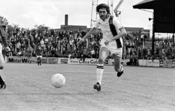 Barry Butlin races onto the ball
