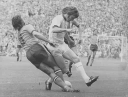 Jimmy Husband wins the ball