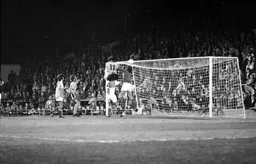 Adrian Alston rises high to head in the only goal of the game