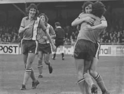 Peter Anderson is congratulated by happy colleagues