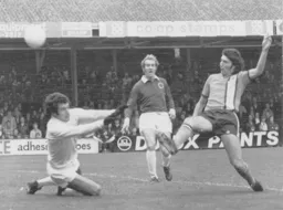 Adrian Alston is unable to beat Leicester's Peter Shilton