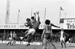 The Birmingham keeper reaches high to collect the ball