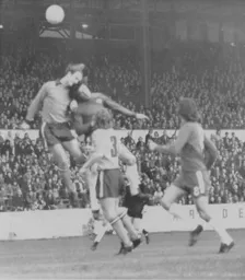 John Faulkner wins a defensive header