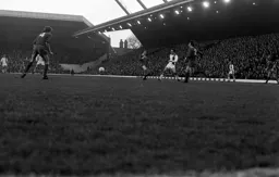 John Aston gets the ball across