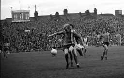 Jimmy Husband closes in to help out his teammate Ron Futcher