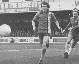 Jimmy Ryan has a start on Chelsea's Ron Harris