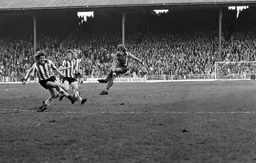 Alan West shoots from outside the box