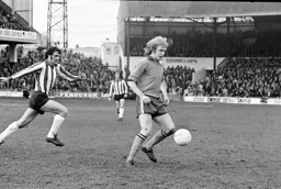 Paul Futcher controls the ball