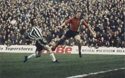 Steve Buckley clears the ball down the line