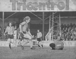 Ron Futcher waits for Peter Shilton to make a slip