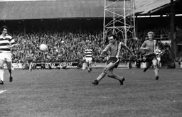 John Aston gets his cross in