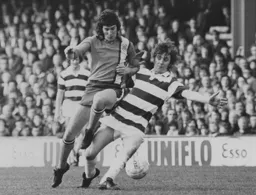 Adrian Alston tangles with Rangers' Stan Bowles