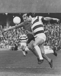 Ron Futcher is challenged by Rangers' Frank McLintock