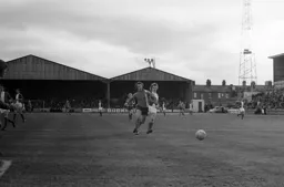 Jimmy Husband looks to get to the ball first