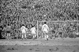 Keith Barber watching John Faulkner clear the ball