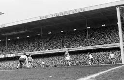 John Aston puts in a header